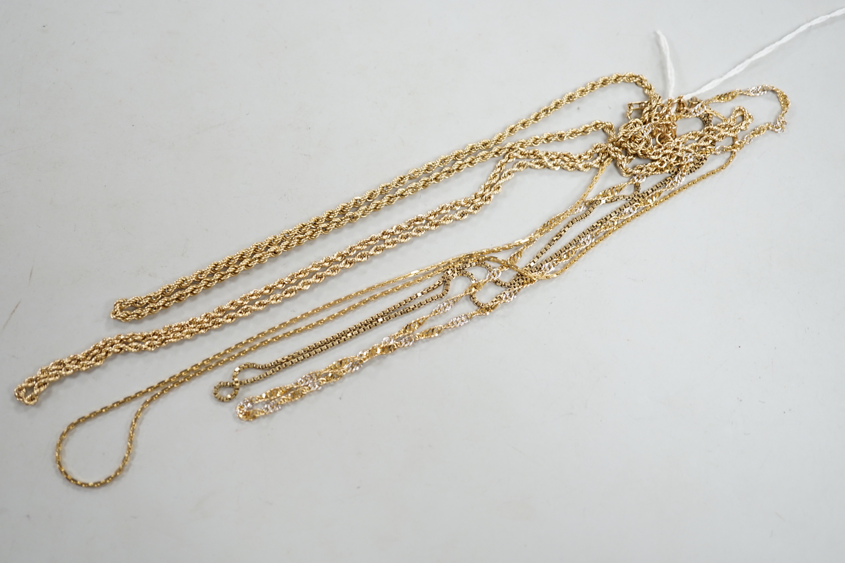 Five assorted modern 9ct gold chains, including two rope twist and one two colour, 44cm, 22.3 grams.